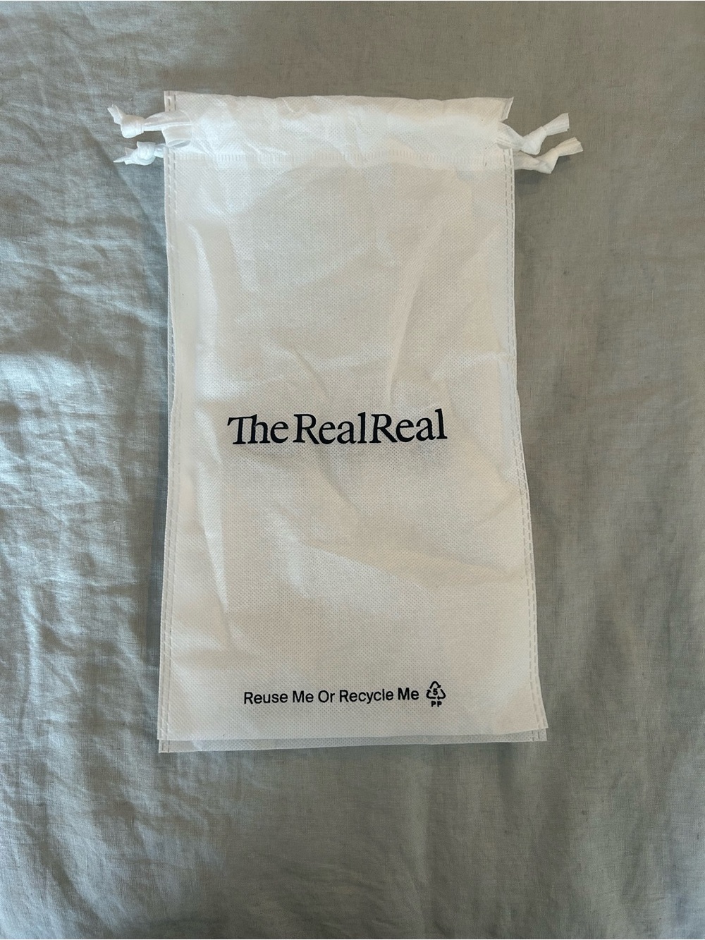 Single TheRealReal dust bag.
